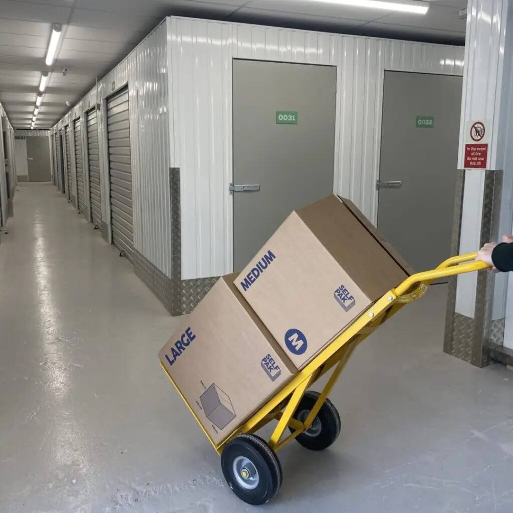 Document Trolley Being Pushed Through Storage Facility