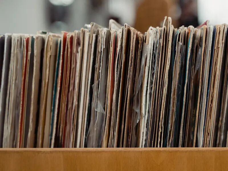 Selection of record covers in wooden box